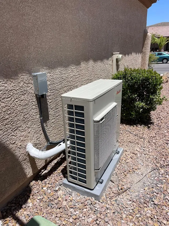 Residential air conditioning condenser unit in Mila Doce